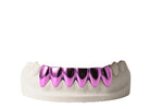 Metallic pink grill on a white background
