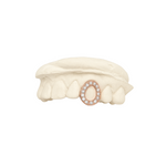 Open Face Window Grillz with a rose gold and diamond design on a white background